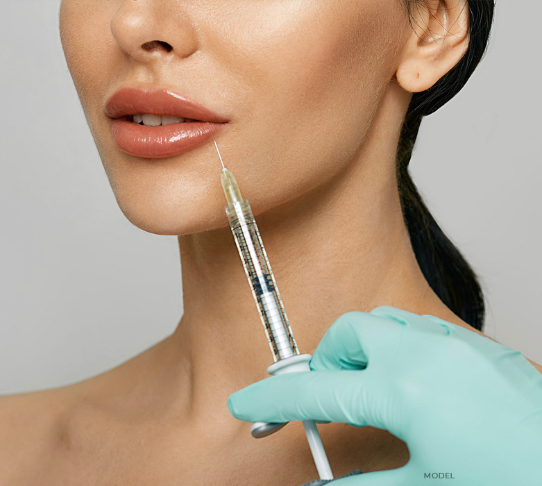 stock image of model having injection under her lip