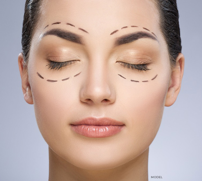 stock image of model having sketch marks around her eyes